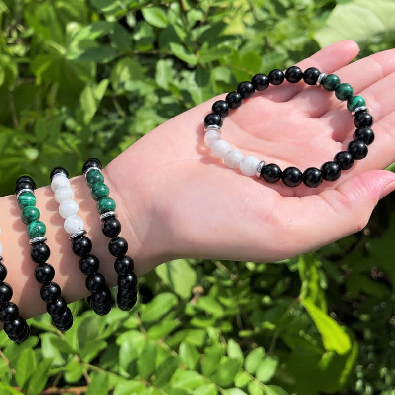 Bracelet en perles de pierre de lune, obsidienne, malachite et pierre de Olivenorma