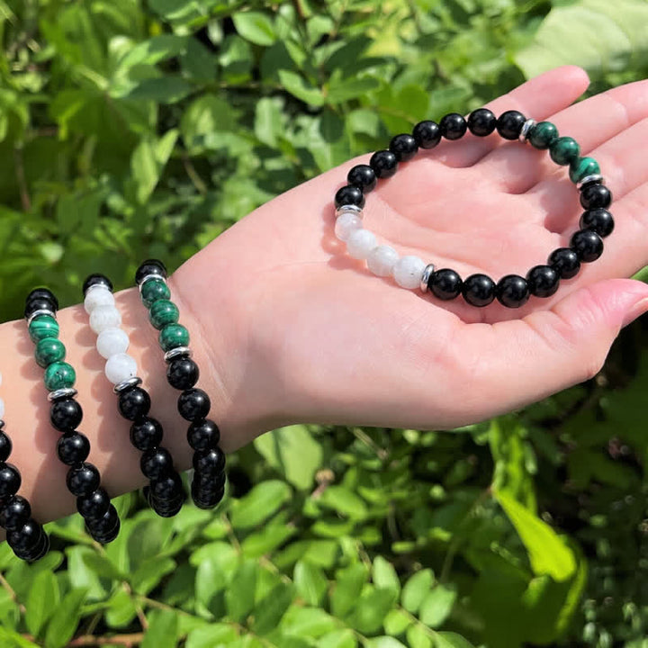 Bracelet en perles de pierre de lune, obsidienne, malachite et pierre de Olivenorma