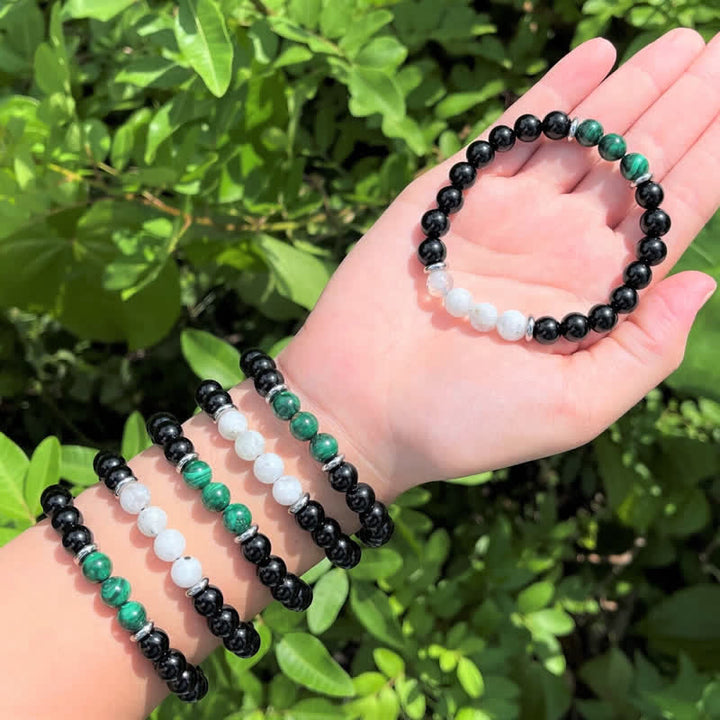 Bracelet en perles de pierre de lune, obsidienne, malachite et pierre de Olivenorma