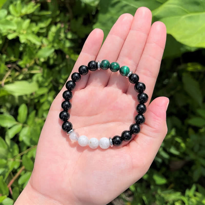Bracelet en perles de pierre de lune, obsidienne, malachite et pierre de Olivenorma