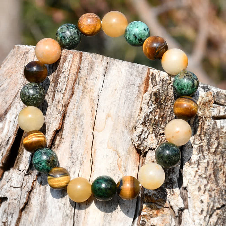 Bracelet en perles d'œil de tigre turquoise africaine en pierre de soleil Olivenorma