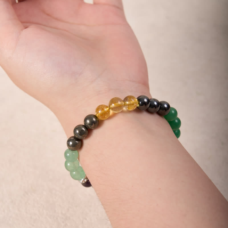 Bracelet Olivenorma en perles d'hématite, d'aventurine verte, d'améthyste et de citrine