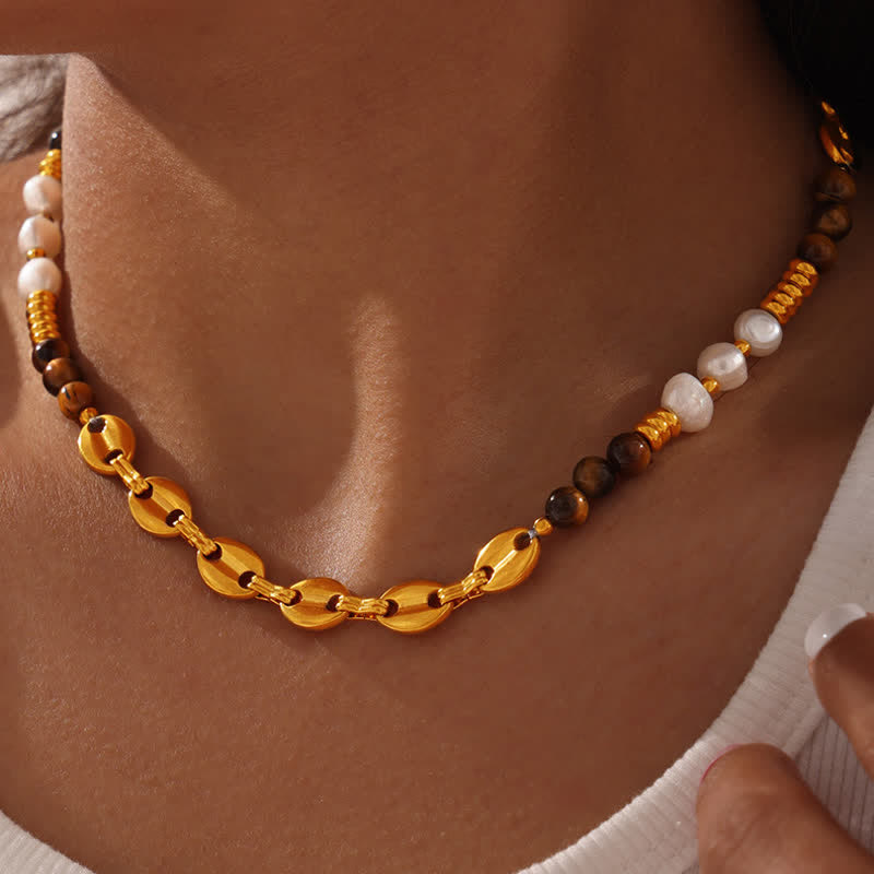 Collier en acier titane et perles d'eau douce en obsidienne œil de tigre Olivenorma 