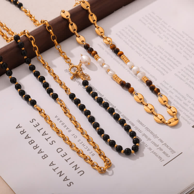Collier en acier titane et perles d'eau douce en obsidienne œil de tigre Olivenorma 