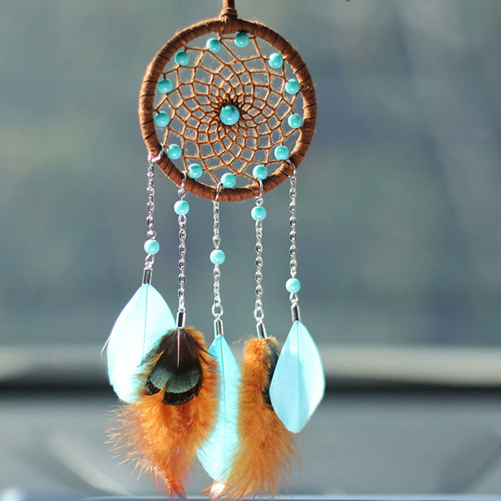 Ornement à suspendre attrape-rêves en plumes turquoise Olivenorma