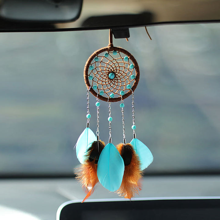 Ornement à suspendre attrape-rêves en plumes turquoise Olivenorma