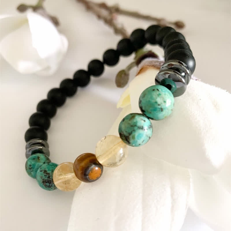 Bracelet en perles de pierre de lave turquoise africaine Olivenorma 