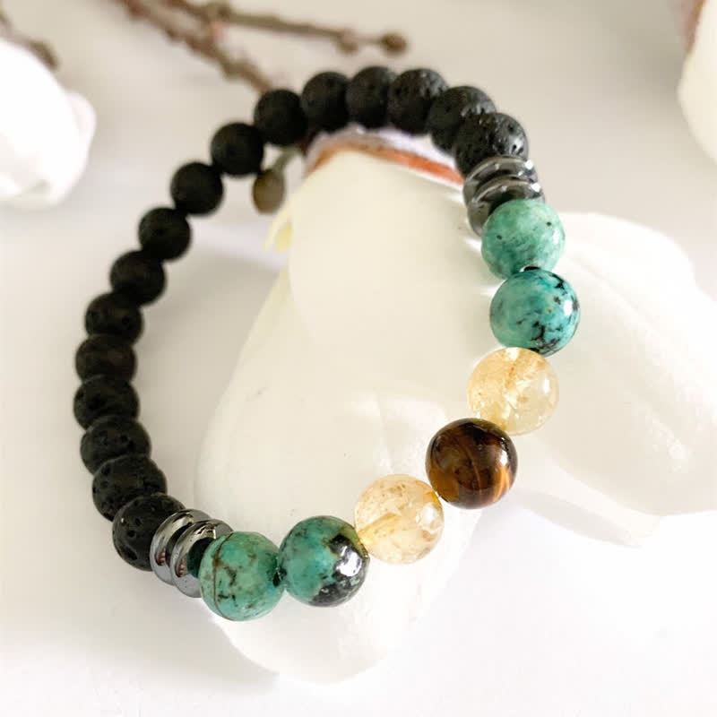 Bracelet en perles de pierre de lave turquoise africaine Olivenorma 