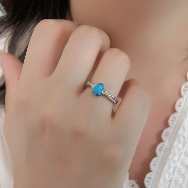 Bague Olivenorma en forme de goutte d'eau avec opale bleue et zircon blanc