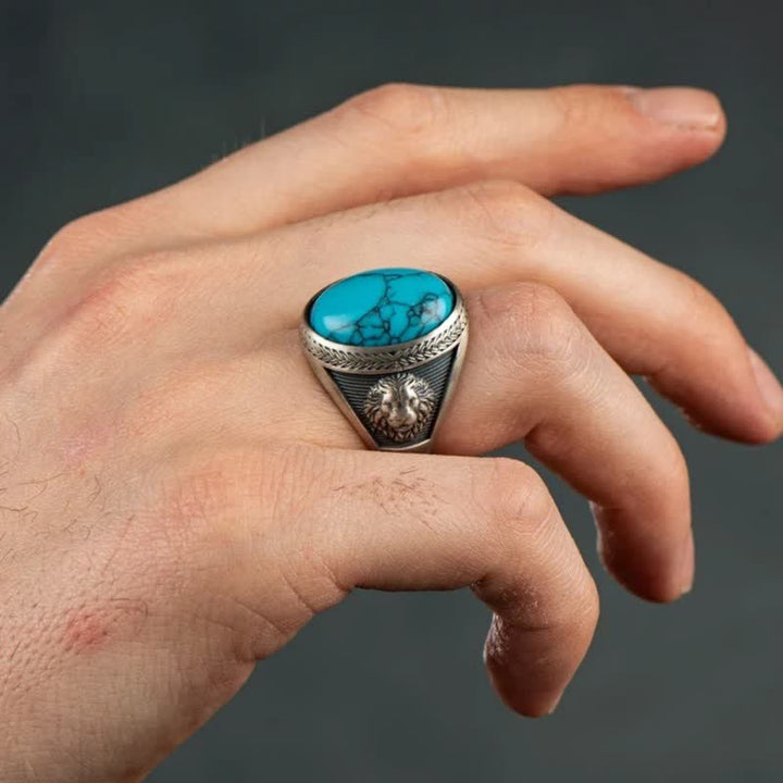 Bague pour homme en argent avec lion ailé ovale turquoise Olivenorma