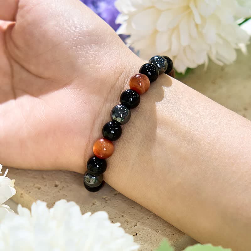 Bracelet de perles en hématite et obsidienne œil de tigre orange Olivenorma 