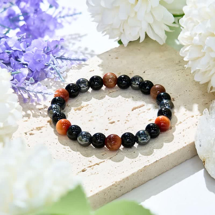 Bracelet de perles en hématite et obsidienne œil de tigre orange Olivenorma 