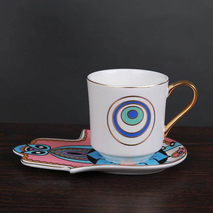 Tasse à café avec dessous de verre en forme de main de Hamsa de Bohème Olivenorma