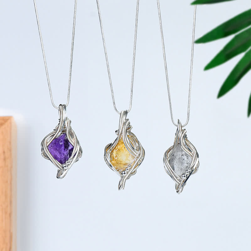 Collier pendentif en cristal naturel enveloppé « Générateur d'énergie » Olivenorma