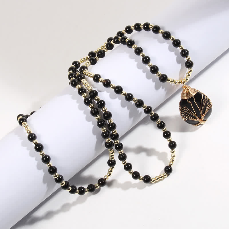 Collier avec pendentif en forme de goutte d'arbre de vie en perles de pierre Olivenorma