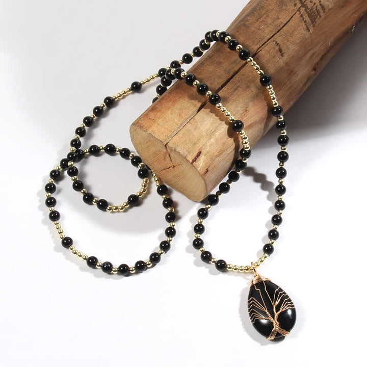 Collier avec pendentif en forme de goutte d'arbre de vie en perles de pierre Olivenorma