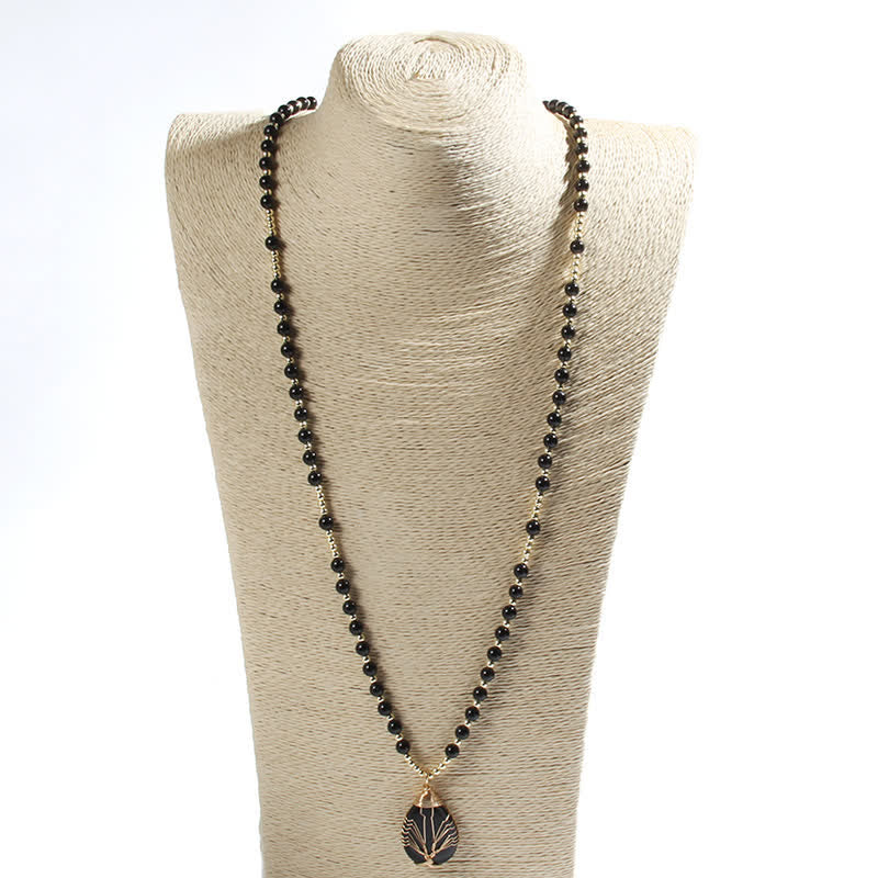 Collier avec pendentif en forme de goutte d'arbre de vie en perles de pierre Olivenorma