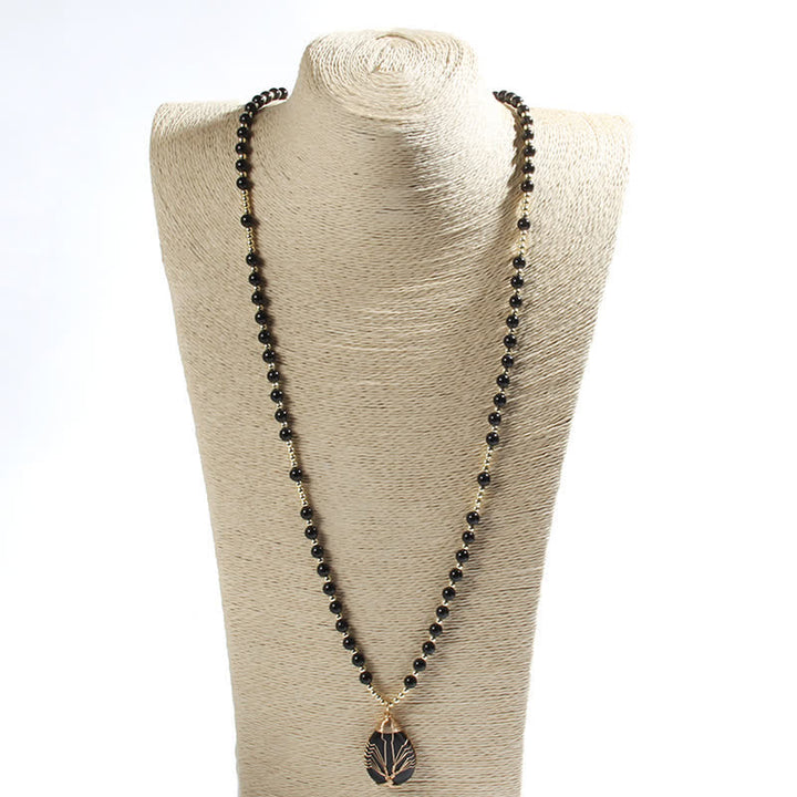 Collier avec pendentif en forme de goutte d'arbre de vie en perles de pierre Olivenorma