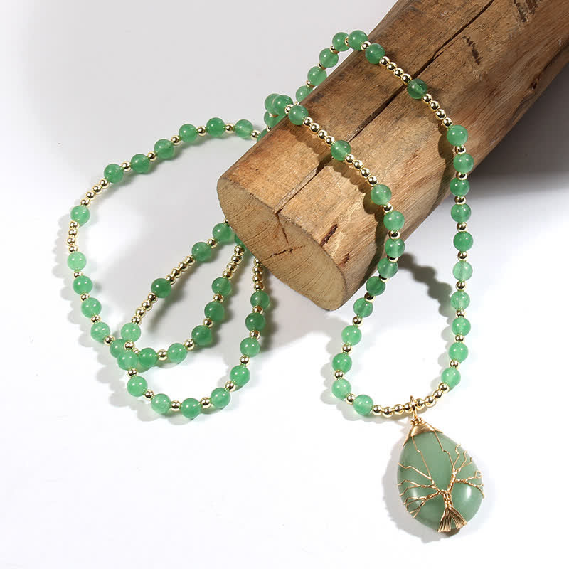 Collier avec pendentif en forme de goutte d'arbre de vie en perles de pierre Olivenorma