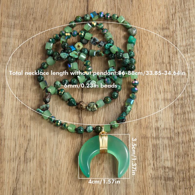 Collier avec pendentif croissant de corne de bœuf en perles de cristal naturel Olivenorma