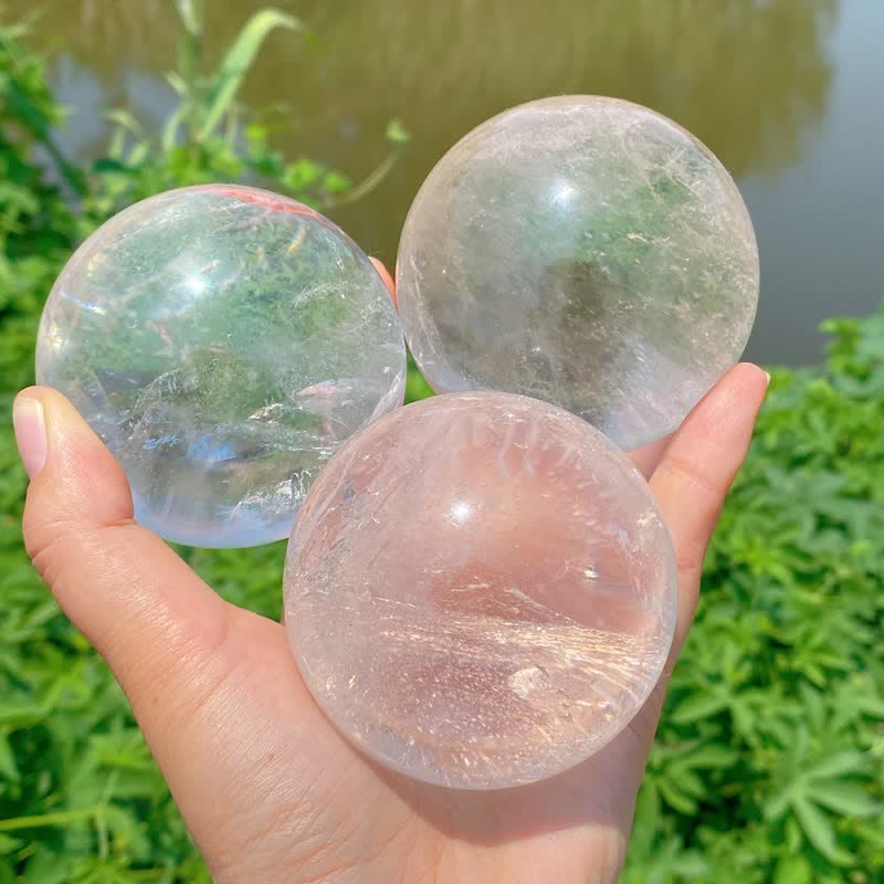 Sphère de cristal de quartz transparent naturel Olivenorma