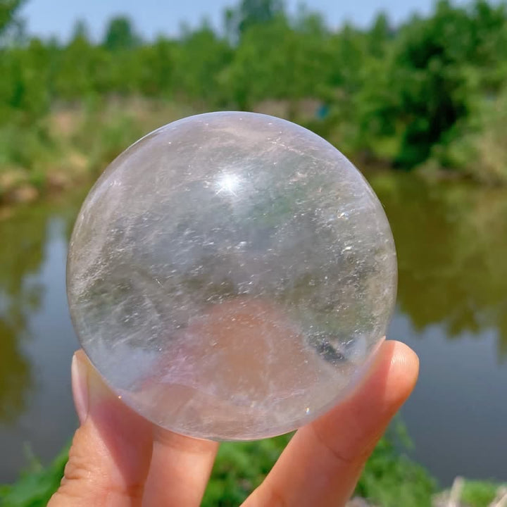 Sphère de cristal de quartz transparent naturel Olivenorma