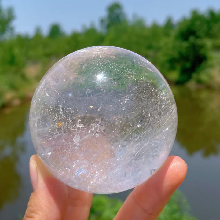 Sphère de cristal de quartz transparent naturel Olivenorma