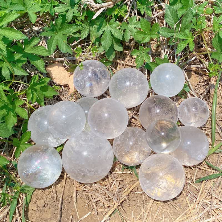 Sphère de cristal de quartz transparent naturel Olivenorma