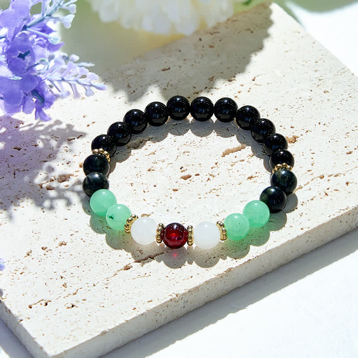 Bracelet en perles d'obsidienne et de grenat naturel Olivenorma