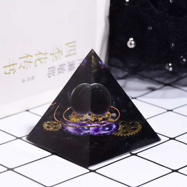 Pyramide d'orgone à engrenage métallique en obsidienne Olivenorma