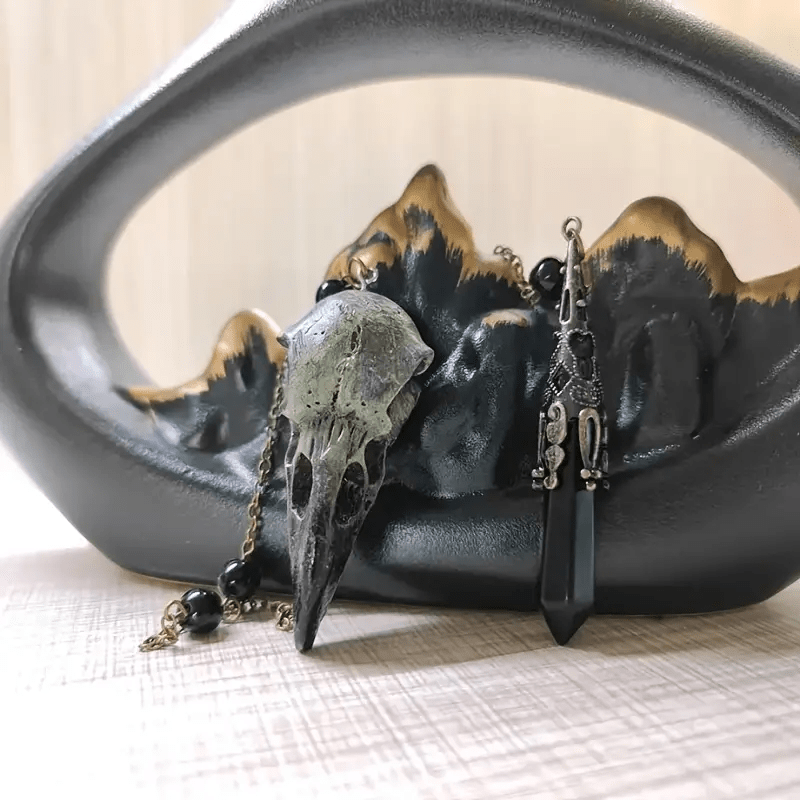 Figurine de crâne de corbeau viking Olivenorma Pendule en obsidienne naturelle