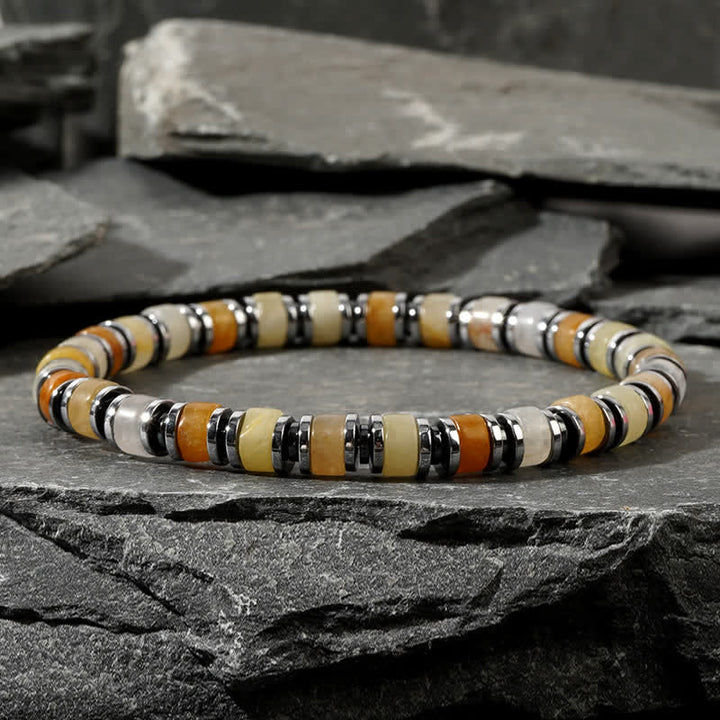 Bracelet Olivenorma en perles de rhodochrosite et pierre de soleil œil de tigre