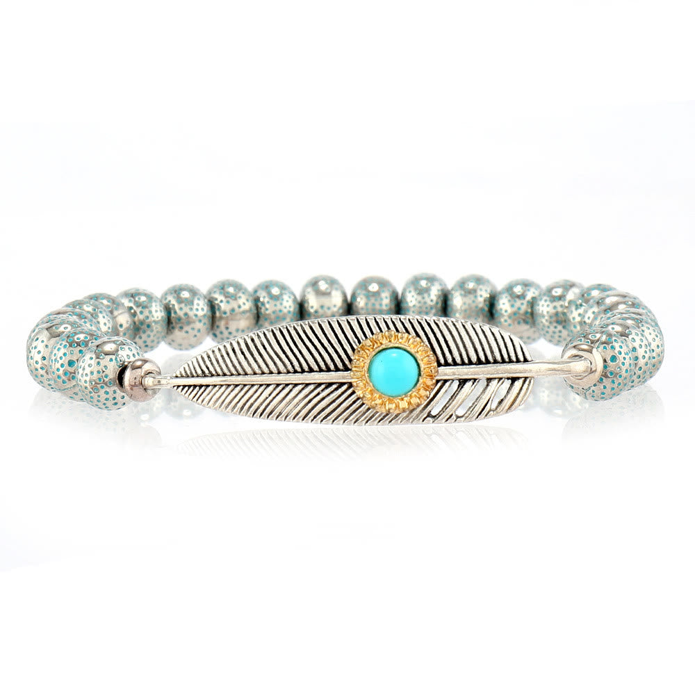 Ensemble de bracelets en perles de bois et plumes turquoise Olivenorma