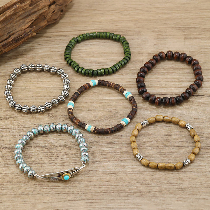 Ensemble de bracelets en perles de bois et plumes turquoise Olivenorma