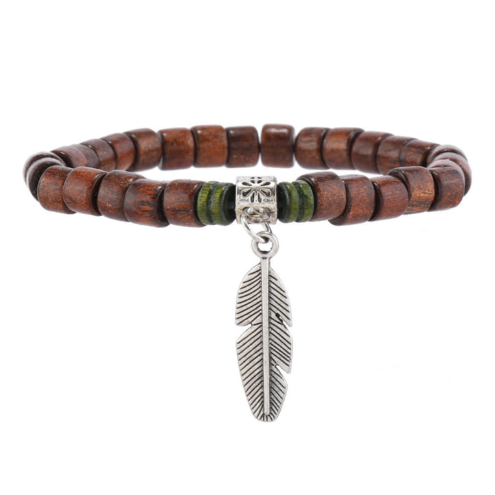 Bracelets empilables en perles de bois et breloques en plumes de Bohème Olivenorma