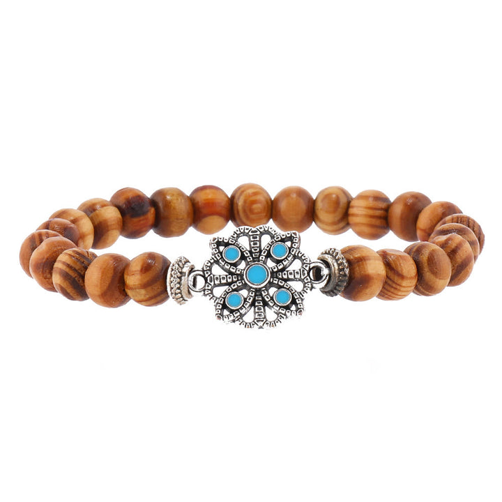 Bracelets empilables en perles de bois et breloques en plumes de Bohème Olivenorma