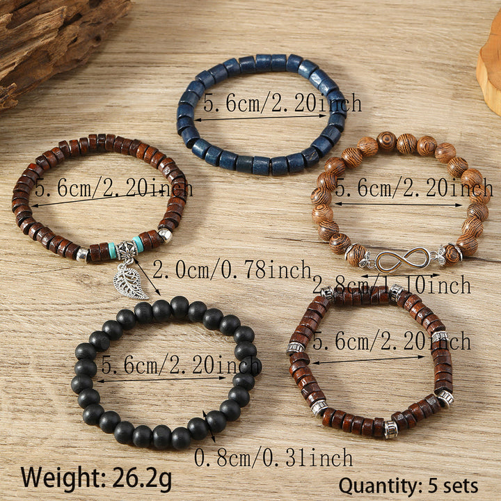 Bracelets empilables en perles de bois et breloques en plumes de Bohème Olivenorma