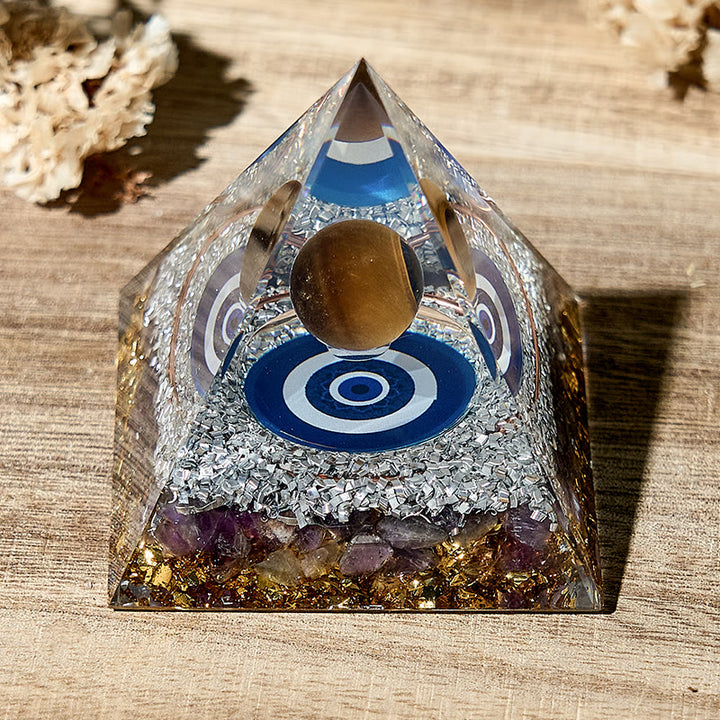 Symbole du mauvais œil Olivenorma Pyramide d'orgone en améthyste naturelle