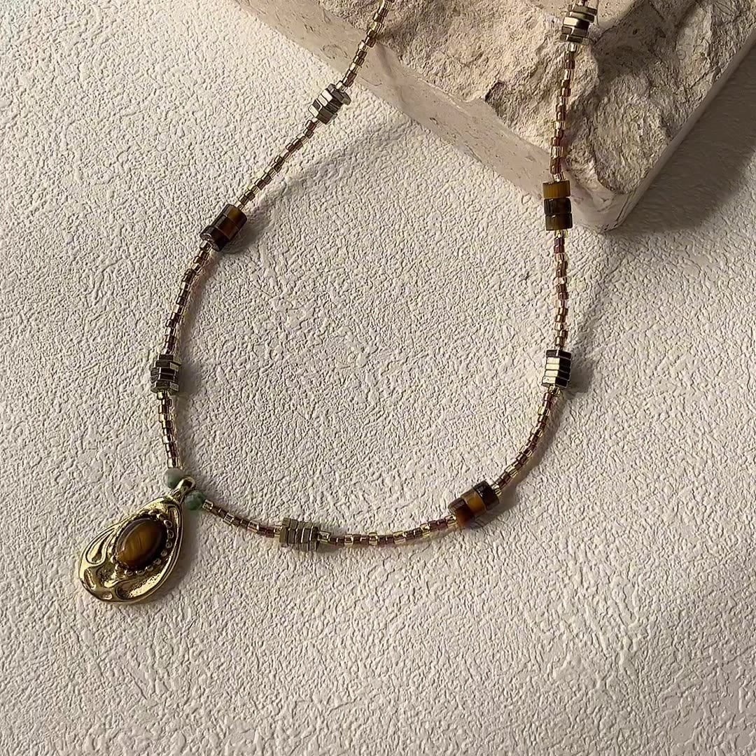 Collier de perles en pierre naturelle d'œil de tigre Olivenorma