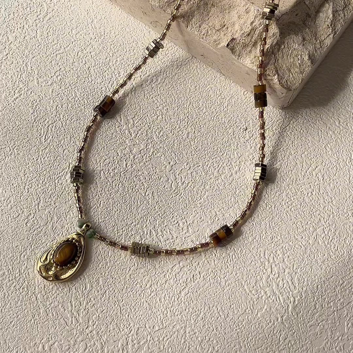 Collier de perles en pierre naturelle d'œil de tigre Olivenorma