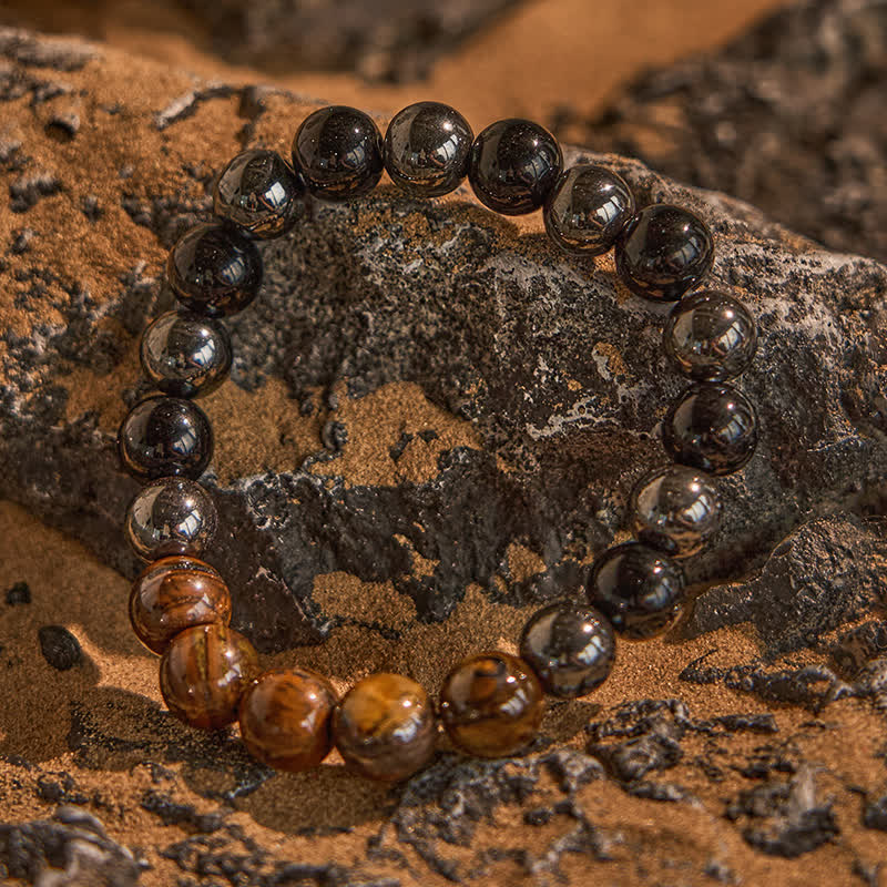 Bracelet de perles en onyx noir et hématite œil de tigre Olivenorma de 10 mm