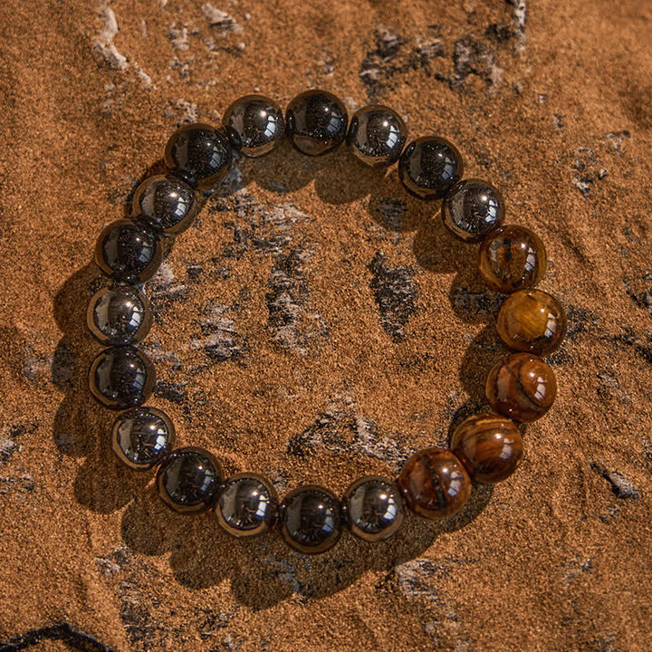 Bracelet de perles en onyx noir et hématite œil de tigre Olivenorma de 10 mm