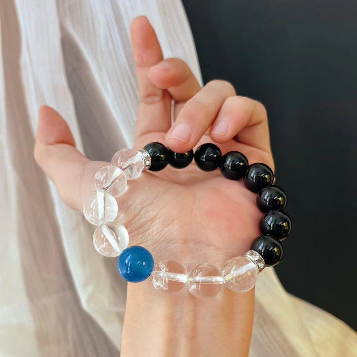 Bracelet Olivenorma en perles de cristal de saphir et d'obsidienne transparente de 12 cm