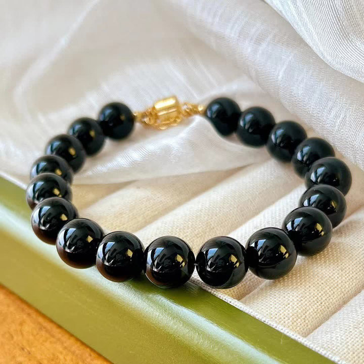 Bracelet magnétique en perles d'obsidienne naturelle Olivenorma