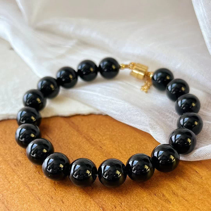 Bracelet magnétique en perles d'obsidienne naturelle Olivenorma