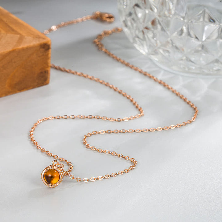 Collier pendentif avec bordure en métal ambré Olivenorma