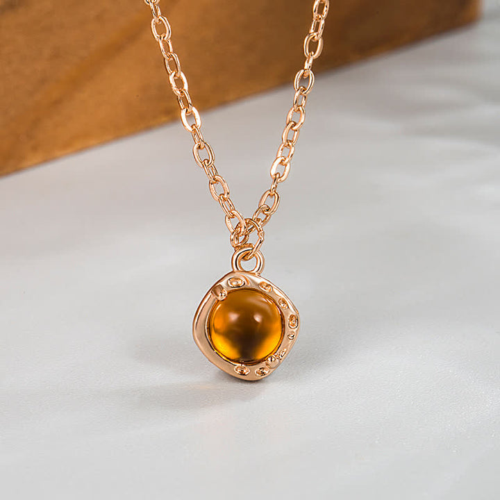 Collier pendentif avec bordure en métal ambré Olivenorma