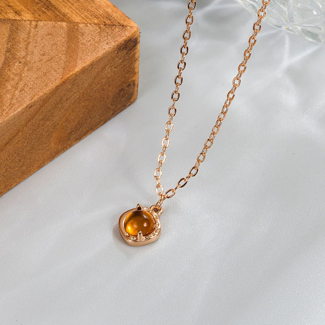 Collier pendentif avec bordure en métal ambré Olivenorma