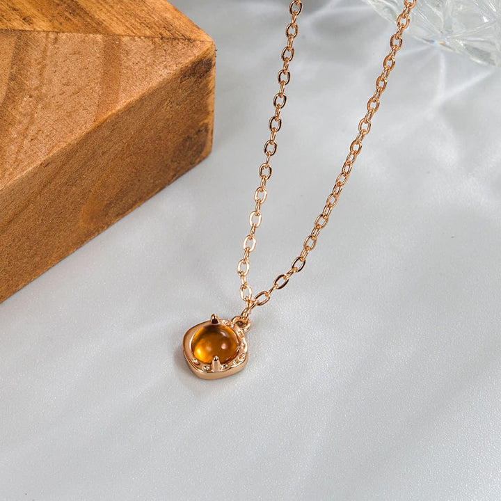 Collier pendentif avec bordure en métal ambré Olivenorma
