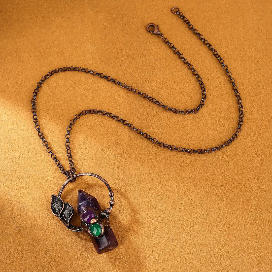 Collier avec pendentif en forme de balle en pierre naturelle Olivenorma